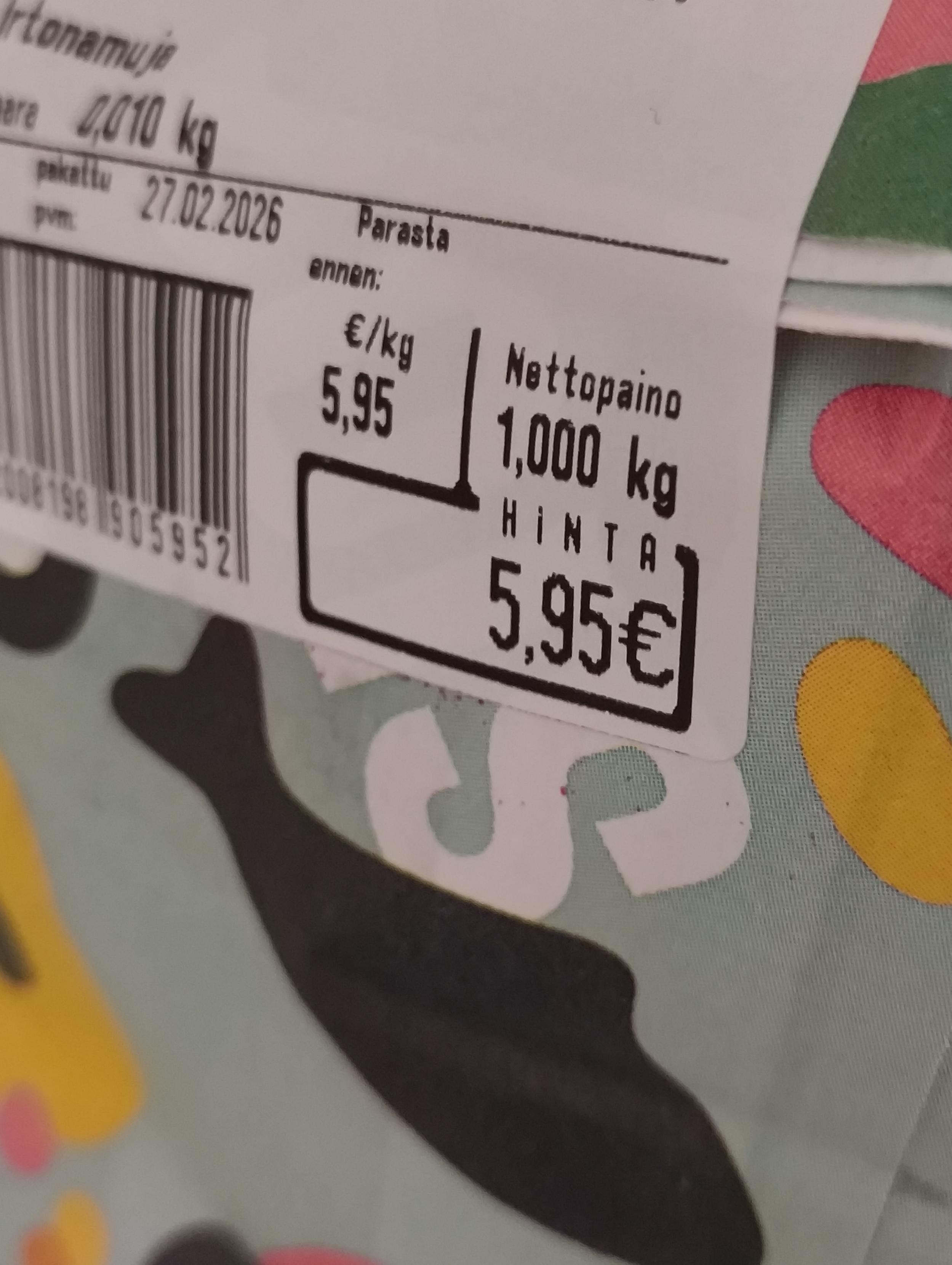 Kuva irtokarkkipussin hintalapusta. Kilohinta 5,95€/kg, pussin nettopaino 1000g ja hinta 5,95€.