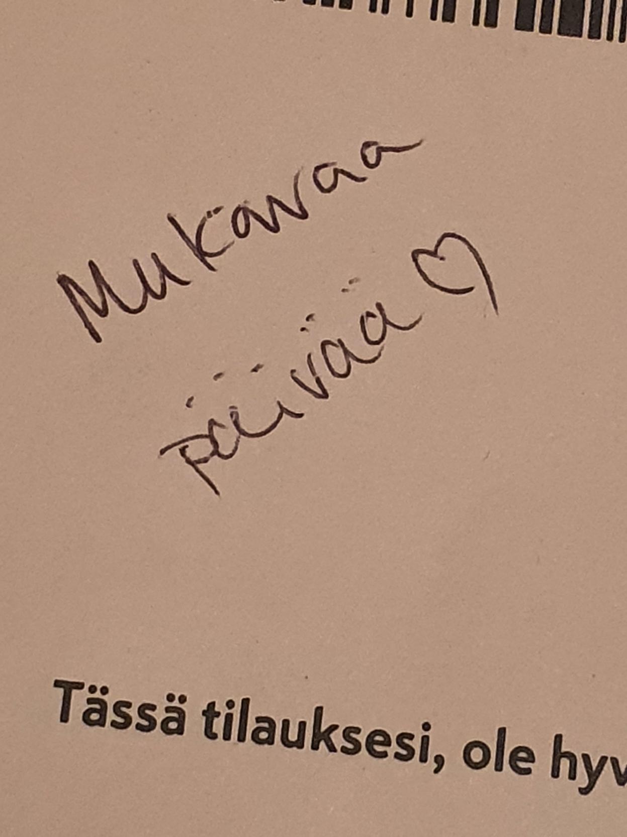 Ruokakaupan tilauskuitti, johon on kirjoitettu käsin tervehdys "Mukavaa päivää ❤"