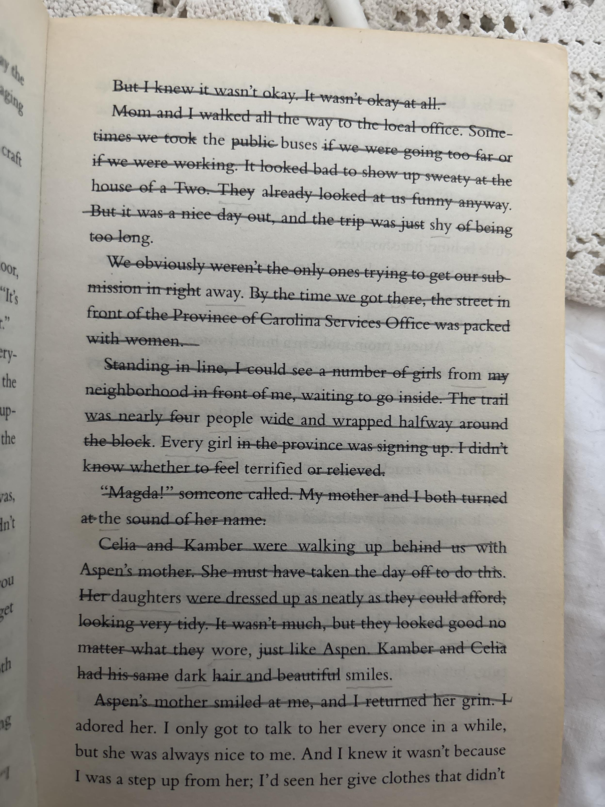 a paperback page with most lines crossed out