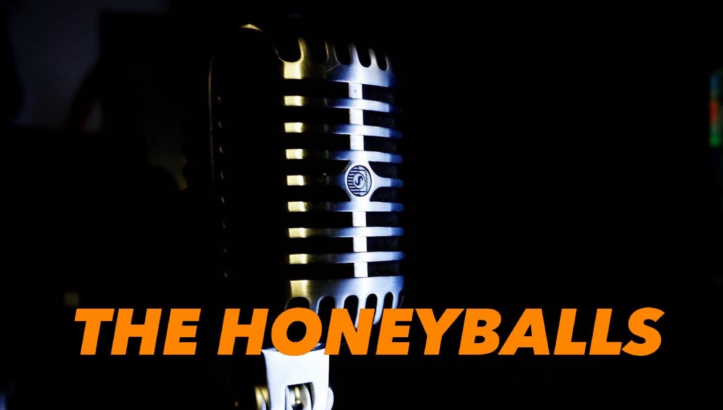 Kuva mikrofonista ja teksti The Honeyballs